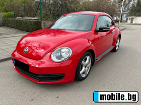     VW New beetle ~25 900 .