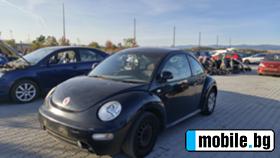     VW New beetle 1.6  ~11 .