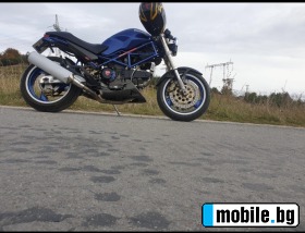     Ducati Monster 900 ~5 900 .
