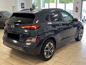 Hyundai Kona CAM/HEAD-UP/64KWH/ТЕРМОПОМПА/CARPLAY/ПОДГРЕВ/NAVI | Auto.bg — изображение 4 Hyundai Kona CAM/HEAD-UP/64KWH/ТЕРМОПОМПА/CARPLAY/ПОДГРЕВ/NAVI | Auto.bg — изображение 4