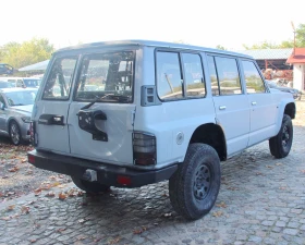 Nissan Patrol 2.8 TD 116 к.с. 6+ 1 МЕСТА С РЕГИСТРАЦИЯ - 5100 € / 9974.73 лв. - 40415211 5 | Car24.bg Nissan Patrol 2.8 TD 116 к.с. 6+ 1 МЕСТА С РЕГИСТРАЦИЯ - 5100 € / 9974.73 лв. - 40415211 5