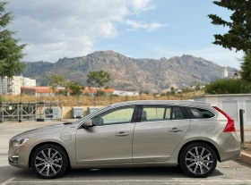 Обява за продажба на Volvo V60 D6 AWD/Plug-in/Дистроник/Line assist