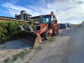 Багер New Holland FB100