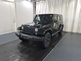 Jeep Wrangler * 4wd 4dr Sahara * CARFAX * ПОДГРЕВ