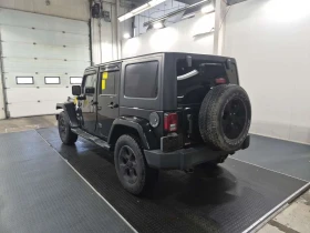 Jeep Wrangler * 4wd 4dr Sahara * CARFAX * ПОДГРЕВ | Auto.bg — изображение 5 Jeep Wrangler * 4wd 4dr Sahara * CARFAX * ПОДГРЕВ | Auto.bg — изображение 5