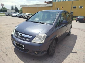 Opel Meriva 1.3CDTI ВЕРИГА много икономичен | Auto.bg — изображение 4 Opel Meriva 1.3CDTI ВЕРИГА много икономичен | Auto.bg — изображение 4