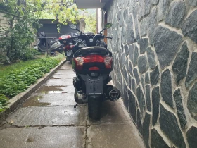Kymco Downtown 200i 2014 година | Auto.bg — изображение 5 Kymco Downtown 200i 2014 година | Auto.bg — изображение 5