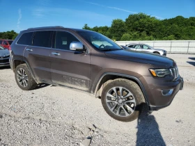 Jeep Grand cherokee LIMITED/4X4/ПАНОРАМА/ВИДЕО НА МОТОРА - 29800 лв. / 15236.50 € - 60873674 3 | Car24.bg Jeep Grand cherokee LIMITED/4X4/ПАНОРАМА/ВИДЕО НА МОТОРА - 29800 лв. / 15236.50 € - 60873674 3