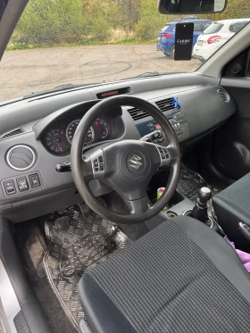 Suzuki Swift 1.3i газ-бензин | Auto.bg — изображение 8 Suzuki Swift 1.3i газ-бензин | Auto.bg — изображение 8