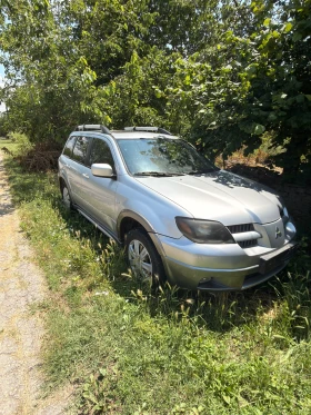 Mitsubishi Outlander 2.4 газ/бензин 163 к.с.