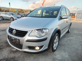 VW Touran TDI CROSS / АВТОМАТИК / 6+ 1 МЕСТА / НАВИГАЦИЯ - Car24.bg VW Touran TDI CROSS / АВТОМАТИК / 6+ 1 МЕСТА / НАВИГАЦИЯ