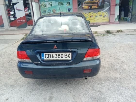 Mitsubishi Lancer - 1999 € - 55947437 4 | Car24.bg Mitsubishi Lancer - 1999 € - 55947437 4