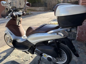 Piaggio Beverly 300i | Auto.bg — изображение 5 Piaggio Beverly 300i | Auto.bg — изображение 5