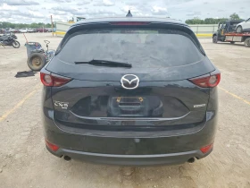 Mazda CX-5 Touring* AWD* ПОДГРЕВ* КАМЕРА* НАВИ* KEYLESS* | Auto.bg — изображение 6 Mazda CX-5 Touring* AWD* ПОДГРЕВ* КАМЕРА* НАВИ* KEYLESS* | Auto.bg — изображение 6