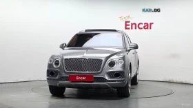 Bentley Bentayga 6.0* W12* ДИСТРОНИК* ПОДГРЕВ* ОБДУХ* МАСАЖИ* КАМЕР | Auto.bg — изображение 2 Bentley Bentayga 6.0* W12* ДИСТРОНИК* ПОДГРЕВ* ОБДУХ* МАСАЖИ* КАМЕР | Auto.bg — изображение 2