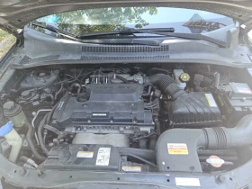 Kia Sportage 2.0 Бензин + Газ | Auto.bg — изображение 16 Kia Sportage 2.0 Бензин + Газ | Auto.bg — изображение 16