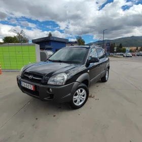 Hyundai Tucson 2.0CRDI* 4WD* KLIMATRONIK* 118 хкм* - Car24.bg Hyundai Tucson 2.0CRDI* 4WD* KLIMATRONIK* 118 хкм*