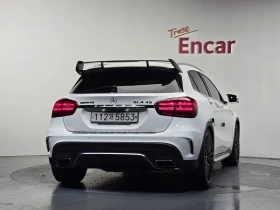 Mercedes-Benz GLA 45AMG LINE/4 MATIC/ПАНОРАМА/ЧЕРВЕН ШЕВ | Auto.bg — изображение 4 Mercedes-Benz GLA 45AMG LINE/4 MATIC/ПАНОРАМА/ЧЕРВЕН ШЕВ | Auto.bg — изображение 4
