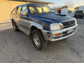 Mitsubishi L200 - 9500 лв. / 4857.27 € - 22857492 14 | Car24.bg Mitsubishi L200 - 9500 лв. / 4857.27 € - 22857492 14
