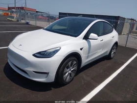 Tesla Model Y LONG RANGE DUAL MOTOR ALL WHEEL DRIVE * CARFAX * | Auto.bg — изображение 3 Tesla Model Y LONG RANGE DUAL MOTOR ALL WHEEL DRIVE * CARFAX * | Auto.bg — изображение 3