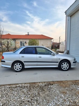Mitsubishi Carisma 1.8 GDI - 1550 € / 3031.54 лв. - 94667224 15 | Car24.bg Mitsubishi Carisma 1.8 GDI - 1550 € / 3031.54 лв. - 94667224 15