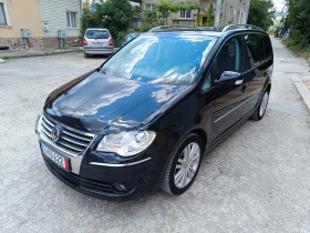 VW Touran 2.0TDI 140к.с. 8V - Car24.bg VW Touran 2.0TDI 140к.с. 8V