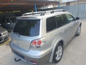 Mitsubishi Outlander 2.0 KLIMA 4X4 NAVI KAMERA - 2700 € - 24289141 4 | Car24.bg Mitsubishi Outlander 2.0 KLIMA 4X4 NAVI KAMERA - 2700 € - 24289141 4