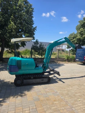 Багер Komatsu PC 20-7