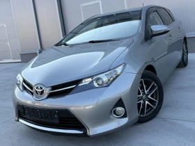 Toyota Auris 2.0 D4D 126кс Navi Камера Темпомат - Car24.bg Toyota Auris 2.0 D4D 126кс Navi Камера Темпомат
