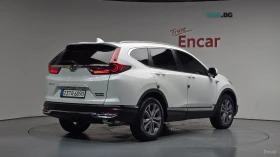 Honda Cr-v 2.0 Hybrid 4x4* HUD* КОЖА* НАВИ* ПАНО* КАМЕРА | Auto.bg — изображение 2 Honda Cr-v 2.0 Hybrid 4x4* HUD* КОЖА* НАВИ* ПАНО* КАМЕРА | Auto.bg — изображение 2