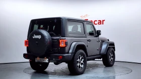 Jeep Wrangler 2.0* KEYLESS* ПОДГРЕВ ВОЛАН* BLIND SPOT* КРАЙНА ЦЕ | Auto.bg — изображение 2 Jeep Wrangler 2.0* KEYLESS* ПОДГРЕВ ВОЛАН* BLIND SPOT* КРАЙНА ЦЕ | Auto.bg — изображение 2