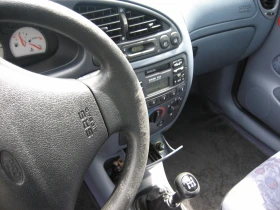 Ford Fiesta FORD FIESTA 1.3 БЕНЗИН 1997 КЛИМАТИК | Auto.bg — изображение 9 Ford Fiesta FORD FIESTA 1.3 БЕНЗИН 1997 КЛИМАТИК | Auto.bg — изображение 9