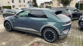 Hyundai Ioniq 5 16 000KM* UNIQ* 77.4KW* 325H.P.ГАРАНЦИЯ ДО 2033г.* - 74500 лв. / 38091.25 € - 73751925 2 | Car24.bg Hyundai Ioniq 5 16 000KM* UNIQ* 77.4KW* 325H.P.ГАРАНЦИЯ ДО 2033г.* - 74500 лв. / 38091.25 € - 73751925 2