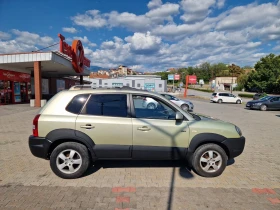 Hyundai Tucson 2.0i 4х4 + газ. уредба - 2700 € / 5280.74 лв. - 62578819 4 | Car24.bg Hyundai Tucson 2.0i 4х4 + газ. уредба - 2700 € / 5280.74 лв. - 62578819 4