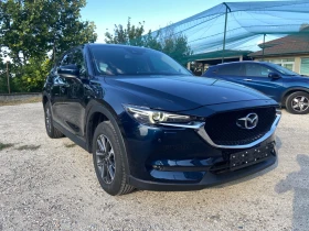 Mazda CX-5 2.5I 4X4 Keyless NAVI Камера Швейцария - 18550 € / 36280.65 лв. - 69269686 4 | Car24.bg Mazda CX-5 2.5I 4X4 Keyless NAVI Камера Швейцария - 18550 € / 36280.65 лв. - 69269686 4