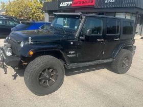 Jeep Wrangler * Sahara * CARFAX * ОПЦИЯ ЗА ФИНАНСИРАНЕ | Auto.bg — изображение 2 Jeep Wrangler * Sahara * CARFAX * ОПЦИЯ ЗА ФИНАНСИРАНЕ | Auto.bg — изображение 2