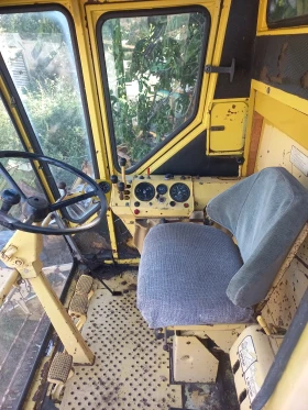 Комбайн New Holland 1550 | Auto.bg — изображение 2 Комбайн New Holland 1550 | Auto.bg — изображение 2