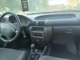 Opel Astra 1.4 | Auto.bg — изображение 5 Opel Astra 1.4 | Auto.bg — изображение 5