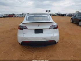 Tesla Model Y PERFORMANCE DUAL MOTOR AWD | Auto.bg — изображение 6 Tesla Model Y PERFORMANCE DUAL MOTOR AWD | Auto.bg — изображение 6