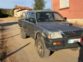 Mitsubishi L200 2.5, 116, ЛЯВ ВОЛАН | Auto.bg — изображение 4 Mitsubishi L200 2.5, 116, ЛЯВ ВОЛАН | Auto.bg — изображение 4