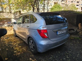 Honda Fr-v Executive XENON - 1199 € - 30709628 4 | Car24.bg Honda Fr-v Executive XENON - 1199 € - 30709628 4