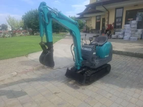 Багер Kobelco 07