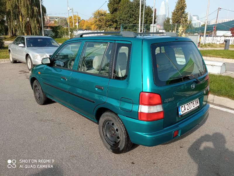 Mazda Demio 1.3 72кс - изображение 4