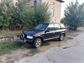 Kia Sportage 2.0 128 к.с.