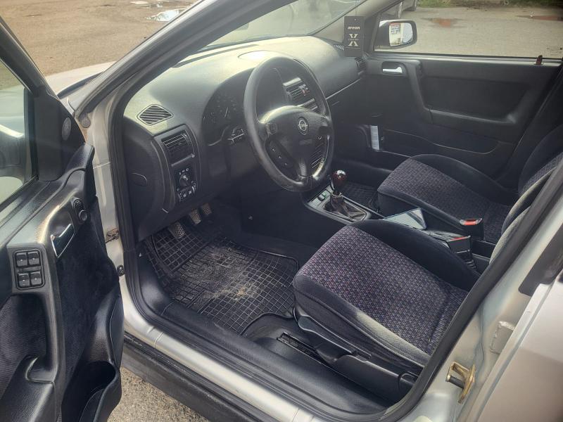 Opel Astra 1.8 - изображение 8