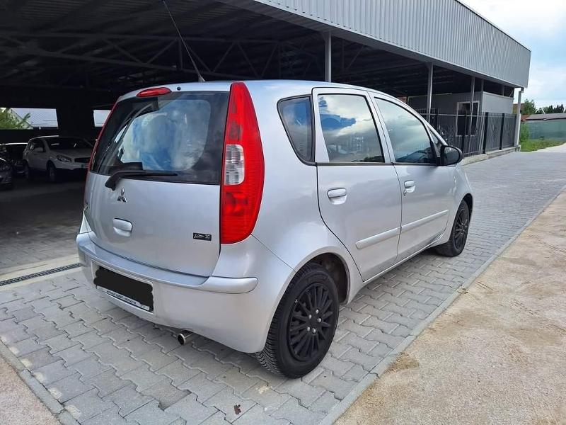 Mitsubishi Colt  - изображение 8