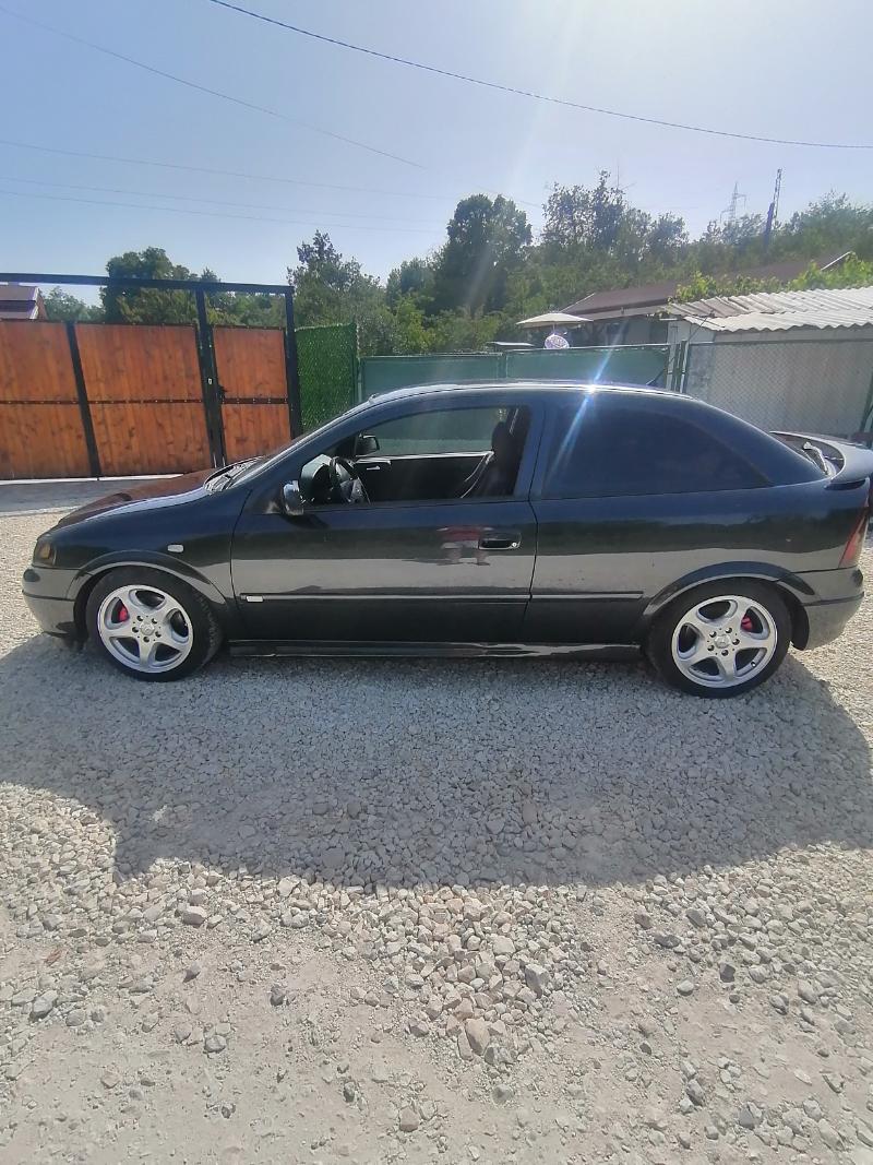 Opel Astra 1.8 - изображение 8