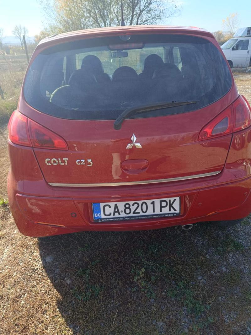 Mitsubishi Colt  - изображение 7