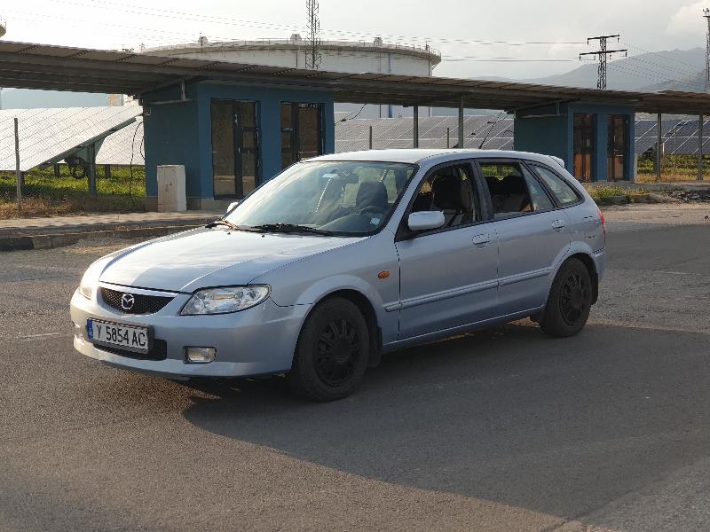 Mazda 323 1.6 Бензин и газ - изображение 2