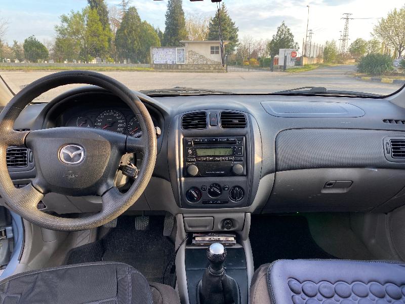 Mazda 323 1.6 Бензин и газ - изображение 5